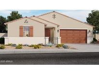 Charming single-story home with a well-maintained front yard and attached two-car garage at 17643 W Mariposa Dr, Goodyear, AZ 85395