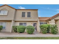 Charming two-story home with desert landscaping, offering a welcoming curb appeal at 5808 E Brown Rd # 49, Mesa, AZ 85205