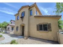 Charming two-story home featuring desert landscaping and a stucco exterior at 14881 W Ashland Ave, Goodyear, AZ 85395