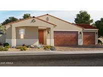 Charming single-story home featuring a tile roof, a two-car garage, and desert landscaping at 17661 W Mariposa Dr, Goodyear, AZ 85395