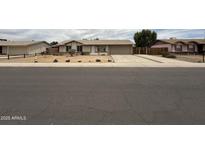 Charming single-story home featuring a low maintenance desert landscape and an attached garage at 1804 W Kristal Way, Phoenix, AZ 85027