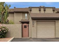 Charming townhome with a one car garage, private courtyard, and desert landscaping at 2338 W Lindner Ave # 52, Mesa, AZ 85202