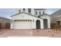 Beautful two story home with brick driveway and desert landscaping at 7668 W Nosean Rd, Peoria, AZ 85383