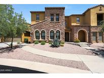 Charming two-story home with desert landscaping and a stone facade at 20750 N 87Th St # 2062, Scottsdale, AZ 85255