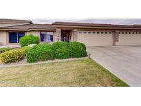 Charming single story home with a two-car garage and well maintained landscaping at 11069 E Kilarea Ave # 194, Mesa, AZ 85209