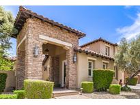 Inviting stone-accented home with covered entryway, manicured landscaping, and a warm, welcoming ambiance at 3441 S Halsted Pl, Chandler, AZ 85286