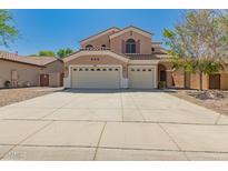 Charming two-story home featuring a three-car garage and well-maintained landscaping at 3750 S Ashley Pl, Chandler, AZ 85286