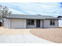 Charming single story home featuring a neutral color palette, new roof, and low maintenance front yard at 2018 W Western Dr, Chandler, AZ 85224