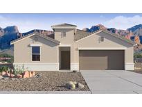 Charming single-story home with a two-car garage, desert landscaping, and stunning mountain views at 2276 W Starfire Ave, Apache Junction, AZ 85120