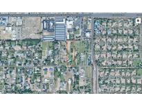 Aerial view of the lot location, surrounded by neighborhood, trees, and streets at 3102 E Backus Rd, Mesa, AZ 85213