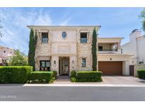 Charming stone home with manicured landscaping, elegant architectural details, and a spacious driveway at 3511 N 39Th Pl, Phoenix, AZ 85018