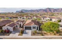 Expansive aerial view capturing the home's location with mountain views in the desert community at 11658 E Chevelon Trl, Gold Canyon, AZ 85118