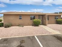 Charming single-story home with a well-maintained desert landscape and inviting entryway at 2614 E Obregon St, Tempe, AZ 85288