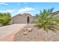 Charming single-story home with desert landscaping, a two-car garage, and a welcoming front entrance at 18644 N 21St St, Phoenix, AZ 85024