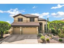 Charming two-story home with a three car garage, desert landscaping, and a tile roof at 2758 N Sterling --, Mesa, AZ 85207