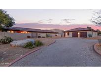 Charming desert home with tile roof, private drive and desert landscaping at 36801 N Long Rifle Rd, Carefree, AZ 85377