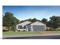Charming single-story home with a two-car garage and manicured lawn at 23398 W Sonrisas St, Buckeye, AZ 85326