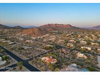 Stunning aerial view of the community, showcasing the desert landscape and mountain views at 8540 E Mcdowell Rd # 119, Mesa, AZ 85207