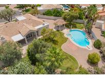 Stunning aerial view of the home featuring a large pool, spa, gazebo, and lush landscaping at 10130 E San Salvador Dr, Scottsdale, AZ 85258