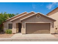 Charming single-story home with a well-maintained yard and a welcoming facade at 125 N 22Nd Pl # 53, Mesa, AZ 85213