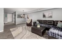 Spacious living room with stylish furniture, providing an inviting atmosphere at 2121 W Union Hills Dr # 113, Phoenix, AZ 85027