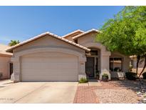 Charming single-story home featuring a well-maintained front yard and an attached two-car garage at 17606 N 2Nd Ave, Phoenix, AZ 85023
