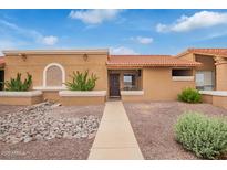 Charming single-story home with a well-maintained front yard and a walkway leading to the front door at 20250 N 6Th Dr # 3, Phoenix, AZ 85027