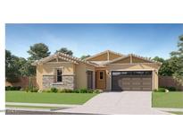 Charming single-story home featuring a two-car garage, desert landscaping, and neutral color palette at 17539 W Victory St, Goodyear, AZ 85338