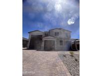 Charming two-story home with a three car garage and beautiful desert landscaping at 18759 E Panchito Dr, Gold Canyon, AZ 85118