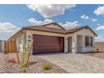Charming single-Gathering home featuring a well-maintained yard and a two-car garage at 25332 N 133Rd Ave, Peoria, AZ 85383