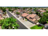 Charming single-Gathering home in a quiet neighborhood with mature landscaping and a tile roof at 7625 W Dreyfus Dr, Peoria, AZ 85381