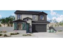 Two-story home featuring a two-car garage, stone accents, gray stucco, shutters, and a cozy front porch at 8920 E Covina St, Mesa, AZ 85207