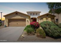 Charming single-Gathering home featuring a two-car garage, desert landscaping and beautiful curb appeal at 157 N 110Th Ave, Avondale, AZ 85323