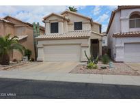 Charming two-story home with desert landscaping in a quiet neighborhood at 4912 W Marco Polo Rd, Glendale, AZ 85308