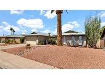 Charming single-story home with well-maintained landscaping and a two-car garage at 7120 N Via De La Sendero --, Scottsdale, AZ 85258