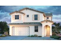 Charming two-story home with a stucco facade, tiled roof, and attached two-car garage at 32487 N 122Nd Ave, Peoria, AZ 85383