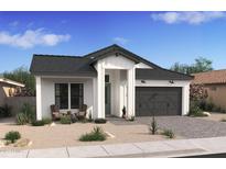Charming single-story home with neutral paint, black roof, and lovely desert landscaping at 521 E Aurora Dr, San Tan Valley, AZ 85140