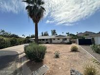 Charming single-story home with desert landscaping and mountain views in a desirable neighborhood at 4808 N 69Th St, Scottsdale, AZ 85251