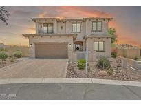 Charming two-story home with a well-manicured front yard at 9017 E June Cir, Mesa, AZ 85207