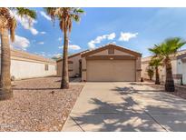 Charming single-story home showcasing a well-maintained exterior and desert landscaping at 1507 W Mesquite Ave, Apache Junction, AZ 85120