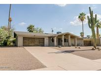 Charming single-story home featuring a well-maintained yard and inviting curb appeal at 2611 E Cheryl Dr, Phoenix, AZ 85028