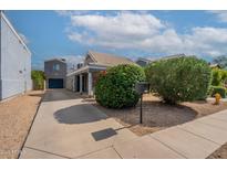 Charming single-story home with a tile roof, desert landscaping, and a private two-car garage at 2731 E Windsor Ave, Phoenix, AZ 85008