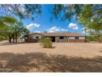 Charming single-story home featuring desert landscaping, a well-maintained exterior and a welcoming facade at 7102 E Kalil Dr, Scottsdale, AZ 85254