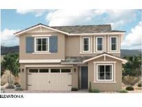 Charming two-story home with a neutral color scheme, light trim, and decorative shutters at 16968 W Winston Dr, Goodyear, AZ 85338