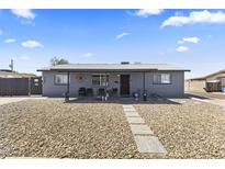 Charming single-story home with neutral paint and rock landscaping for low maintenance at 3307 W Willow Ave, Phoenix, AZ 85029