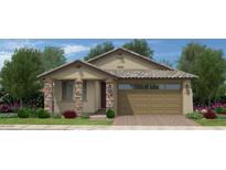 Charming single-story home with a stone-accented facade, two-car garage, and landscaped front yard at 3551 W Mary Dr, San Tan Valley, AZ 85144