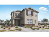 Charming two-story home with neutral exterior, stylish shutters, and professionally landscaped front yard at 14665 W Sand Hills Rd, Surprise, AZ 85387
