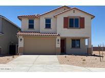 Charming two-story home with a two car garage, landscaped yard, and classic shutters at 31878 N Bandit Rd, San Tan Valley, AZ 85143