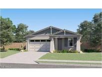 Charming single-story home featuring a two-car garage, landscaped front yard, and welcoming entrance at 38233 N Stillmeadow Rd, San Tan Valley, AZ 85140