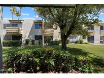 Charming condo features lush landscaping, mature trees and serene courtyard views at 4610 N 68Th St # 411, Scottsdale, AZ 85251